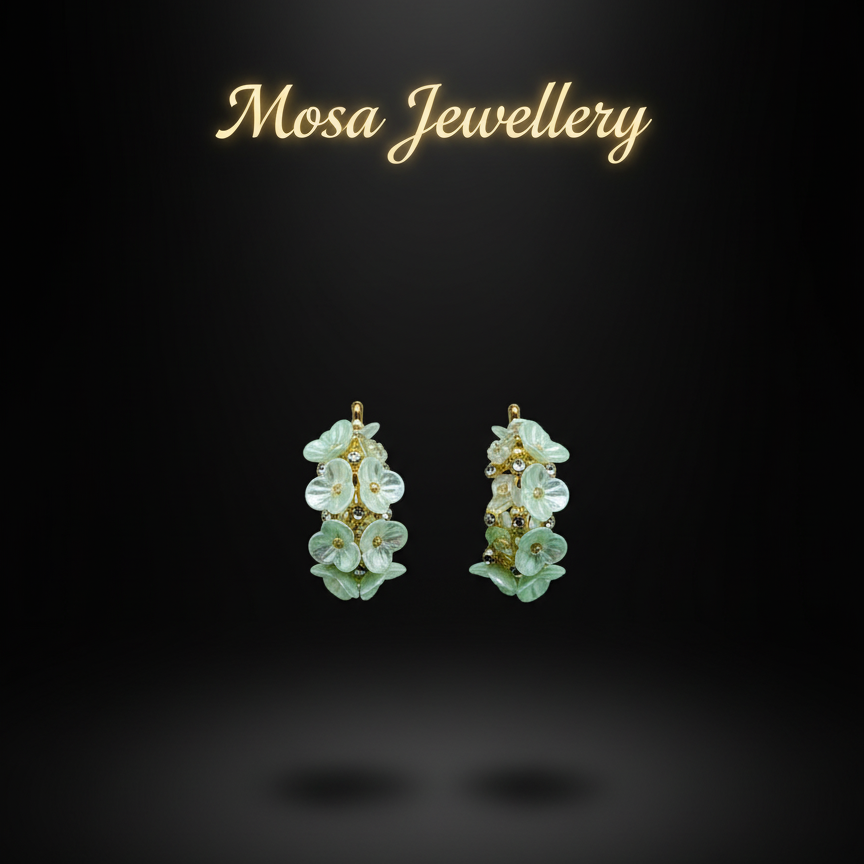 Pair of green floral earrings on a black background with 'Mosa Jewellery' text.