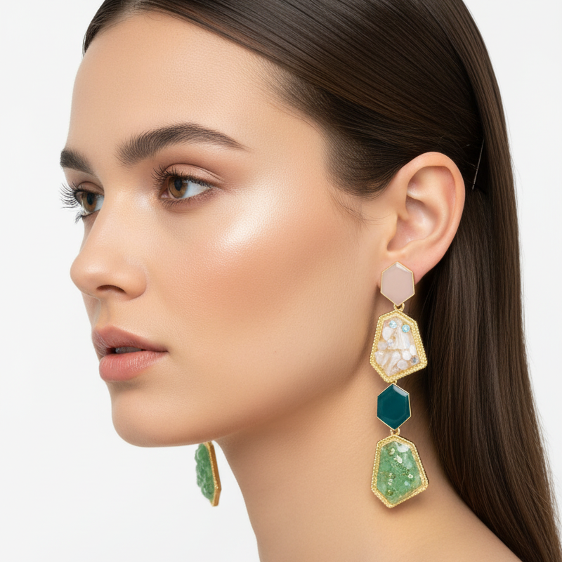 Woman wearing colorful earrings on a plain background